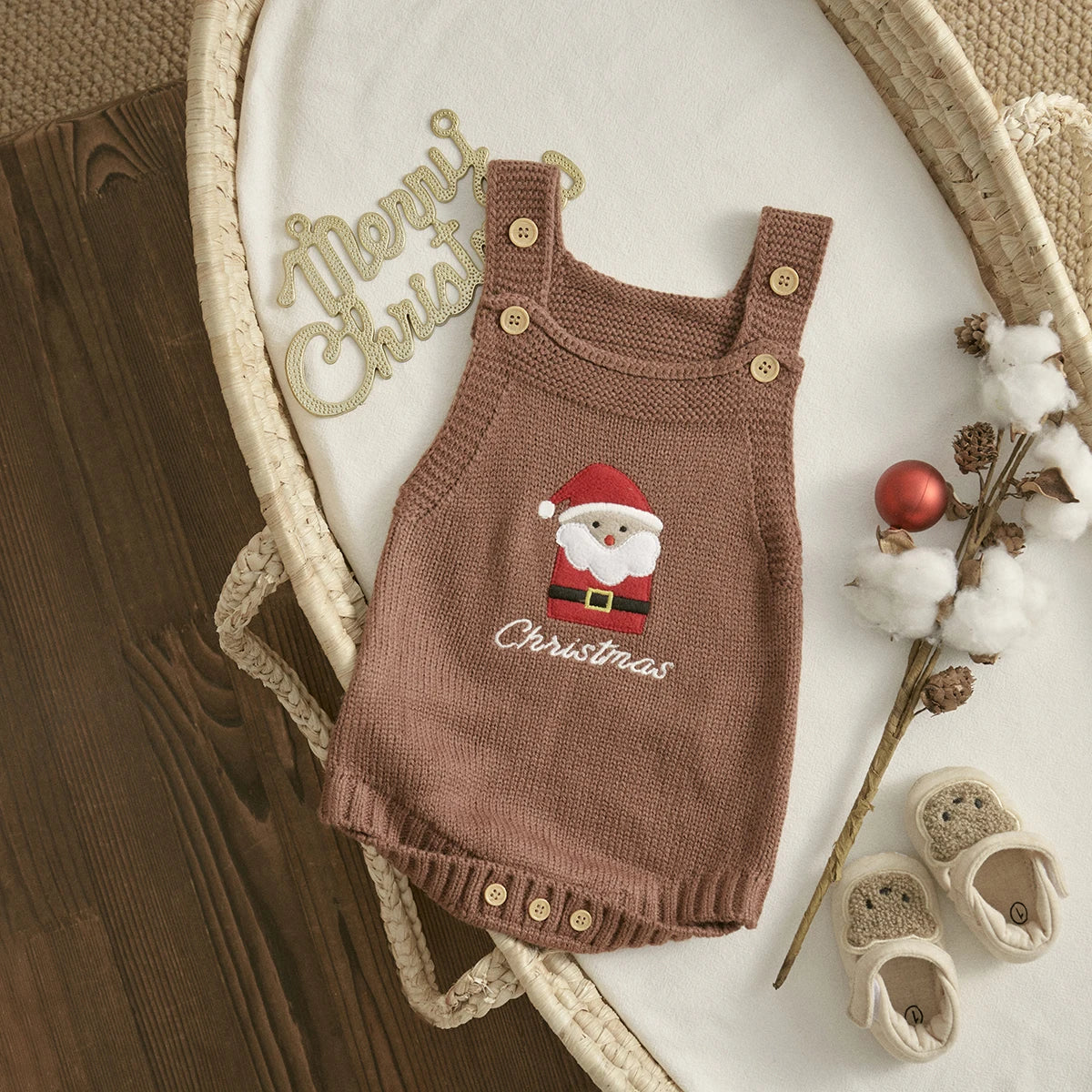 Barboteuse Noël bébé en maille à bretelles