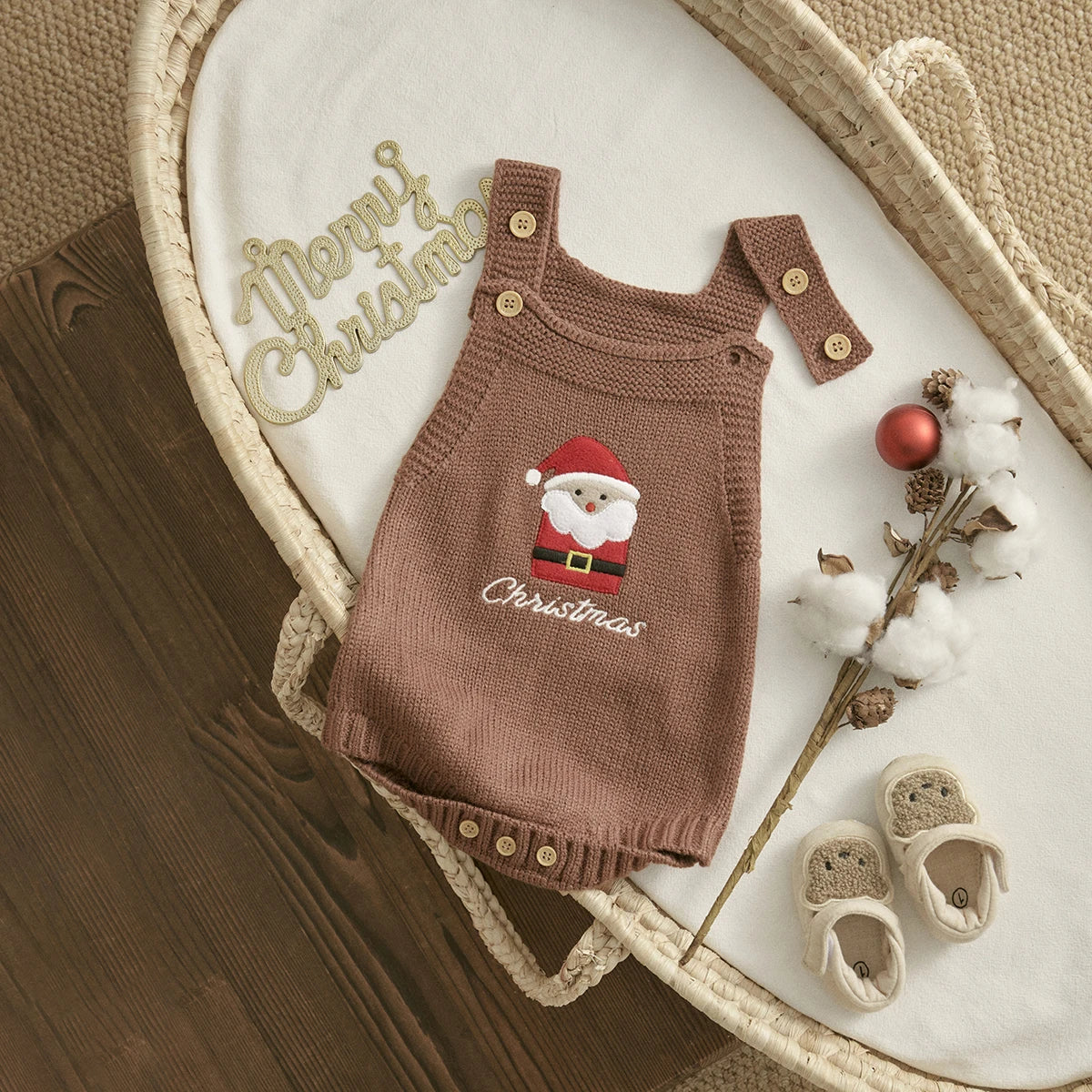 Barboteuse Noël bébé en maille à bretelles